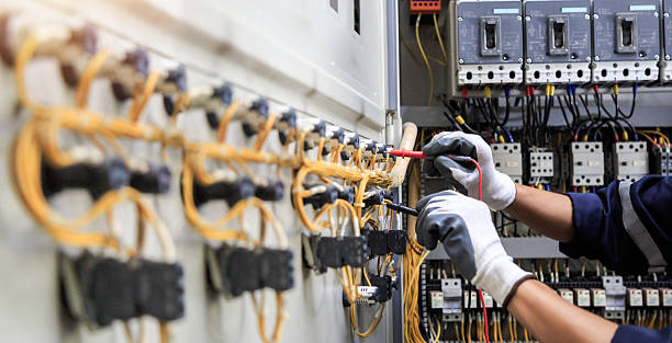 Professional Electrician technician working in Versailles, PA